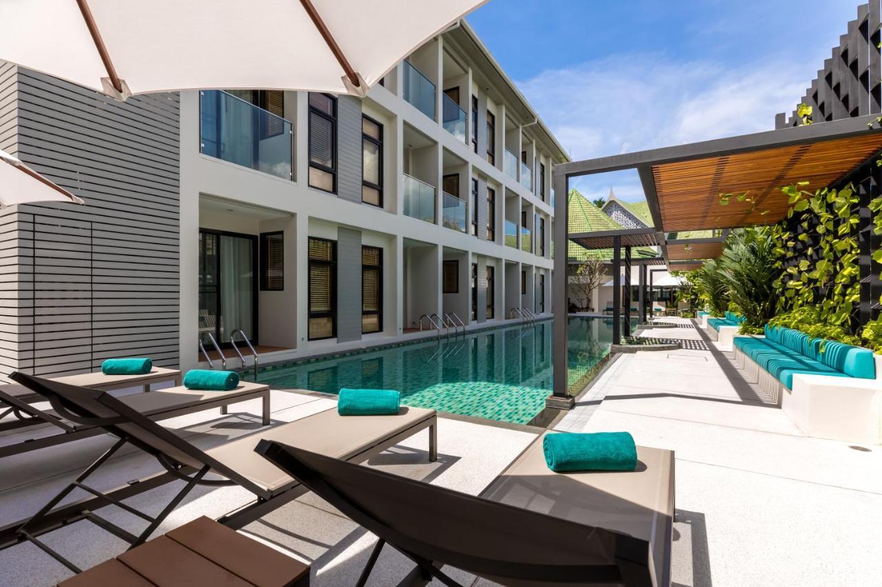 Outrigger Surin Beach Resort - Sha Extra Plus Exterior foto The swimming pool at the hotel